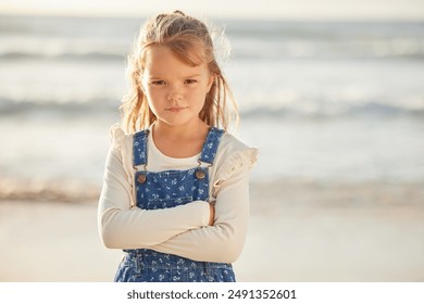 Portrait, beach and girl with arms crossed, angry and upset with expression, emotion and vacation. Face, kid and child with emoji, frustrated and bored with adhd, tantrum and travel with autism - Powered by Shutterstock