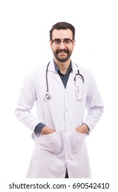 Portrait of beard doctor in white lab coat with stethoscope and glasses smiling and standing confidently, isolated on white background