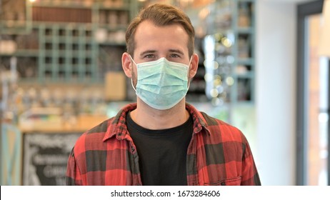 Portrait Of Beard Young Man With Protective Face Mask