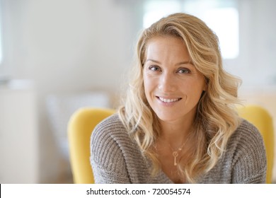 Portrait of beautiful 40-year-old blond woman  - Shutterstock ID 720054574