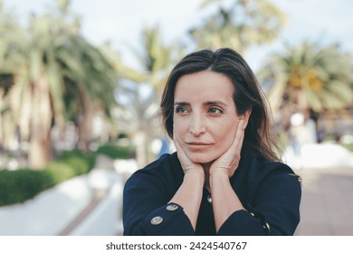 Portrait Of Beautiful Adult Woman Outdoors With Palm Trees In Background. - Powered by Shutterstock