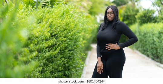 Portrait Of Beautiful African Fat Woman Standing Outdoor. Black People.