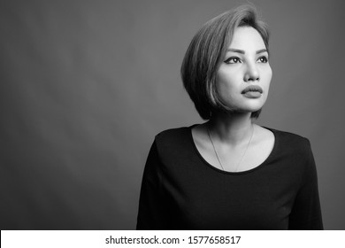 Portrait Of Beautiful Asian Businesswoman In Black And White