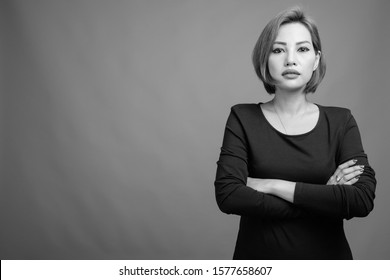 Portrait Of Beautiful Asian Businesswoman In Black And White