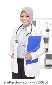 Portrait Of Beautiful Asian Female Doctor With Stethoscope And Pad