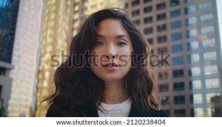 Similar – young asian woman looking up