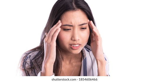 Portrait of beautiful Asian young brunette  touching her temples feeling stress, on white background - Shutterstock ID 1854606466
