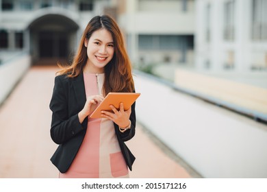 Portrait Of A Beautiful Authentic Satisfied Business Woman Looking At Camera. Concept For Leadership And Successful Startup Millennial.