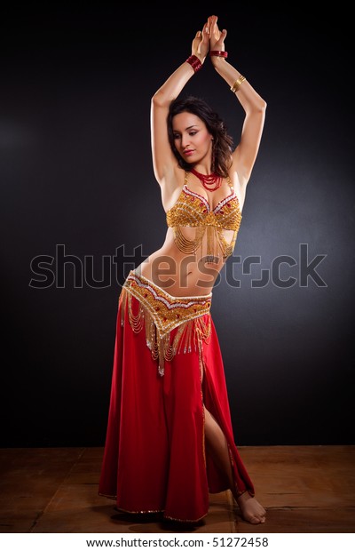A portrait of a\
beautiful belly dancer