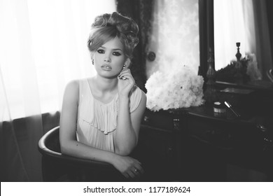 Portrait Of Beautiful Blond Woman With Long Hair And Clean Skin. Brigitte Bardot Look