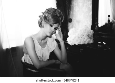 Portrait Of Beautiful Blond Woman With Long Hair And Clean Skin. Brigitte Bardot Look