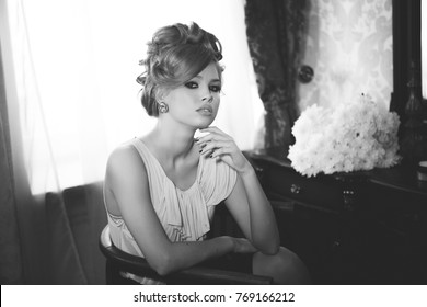 Portrait Of Beautiful Blond Woman With Long Hair And Clean Skin. Brigitte Bardot Look