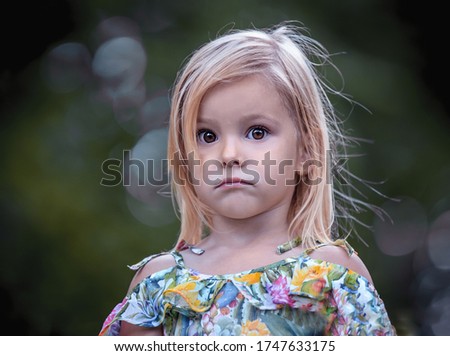 Similar – Small child with long blond hair