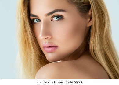 Portrait of beautiful blonde girl with beautiful eyes