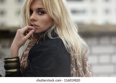portrait of a beautiful blonde outdoor on the street