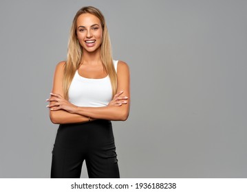 Portrait of beautiful blonde woman isolated on gray background