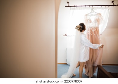 Portrait Of Beautiful Bride With Fashion Veil At Wedding Morning