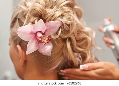 Portrait Of Beautiful Bride With Flowers In Hair