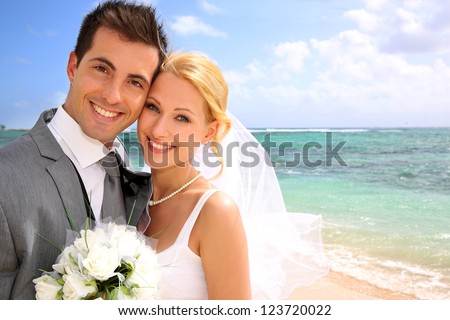 https://image.shutterstock.com/image-photo/portrait-beautiful-bride-groom-beach-450w-123720022.jpg