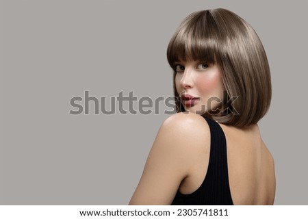 Similar – Image, Stock Photo Portrait of a short-haired blonde in a terracotta scarf in an autumn park