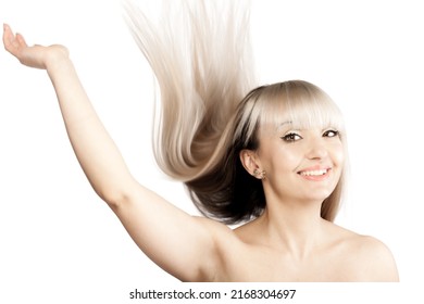 Portrait of a beautiful brunette girl with blond bangs fringe. Throwing hair in the air.