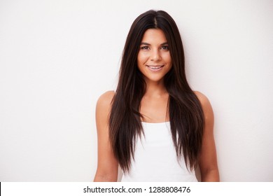 Portrait of beautiful brunette smiling to camera