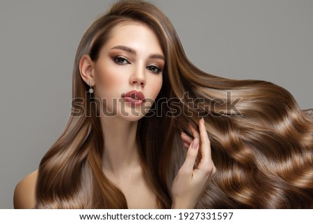 Portrait of a beautiful brunette woman with long wavy hair. Copycpase ストックフォト © 