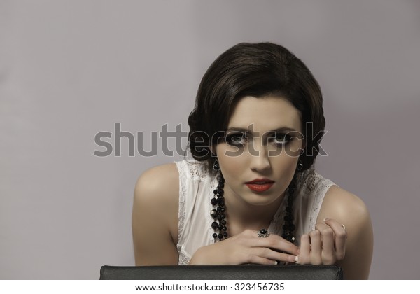 portrait-beautiful-brunette-woman-representing-600w-323456735.jpg