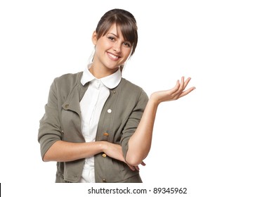 Portrait of beautiful business woman showing copy space over white background - Powered by Shutterstock