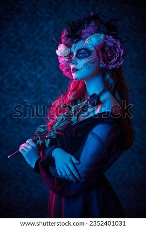 Portrait of beautiful Calavera Catrina on a vintage background. Sugar skull makeup. Dia de los muertos. Day of The Dead. Halloween.