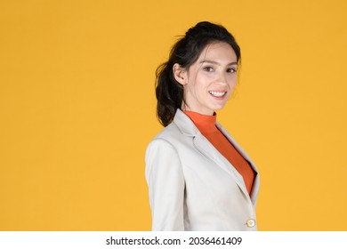 Portrait Of Beautiful Caucasian Bussiness Woman Smile On Yellow Background