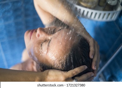 Portrait Of Beautiful Caucasian Woman At Home Doing Shower To Clean And Relax - People Showering In The Bathroom Indoor In Real Life -  Adult Female Morning Activity Before Go Out