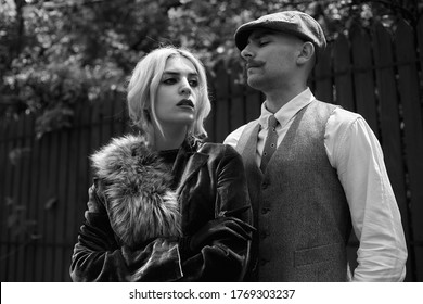 Portrait Of A Beautiful Couple In Vintage Style. Retro Style, Classic Clothes.