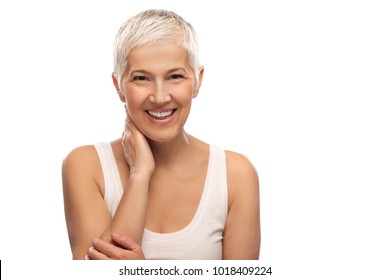 Portrait Of A Beautiful Elderly Woman, Smiling, Isolated On White Background 