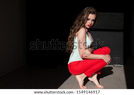 Similar – Beautiful young woman against a mirror wall