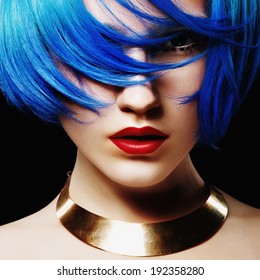 Portrait Of Beautiful Girl With Blue Hair In The Studio