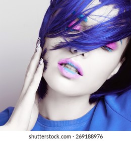 Portrait Of Beautiful Girl With Blue Hair And White Skin With Closed Eyes In Studio, Close Up