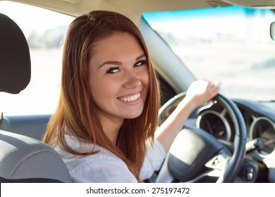 Portrait of beautiful girl in the car. soft light - Shutterstock ID 275197472