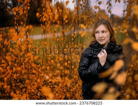 Similar – Foto Bild Herbstportrait eines glücklichen Kindes Mädchens im Garten sitzend