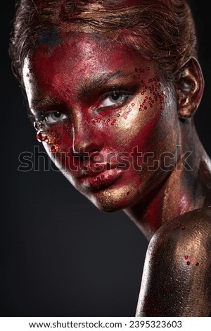 Portrait of a beautiful girl with an exquisite fantasy makeup in the style of legends about ancient greece and pharaohs