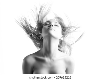 Portrait Of A Beautiful Girl With Flying Blond Hair