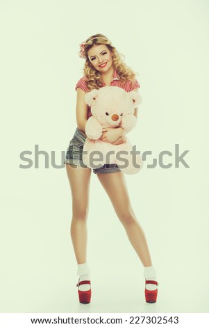 Similar – Image, Stock Photo cute girl near pink wall holding toy