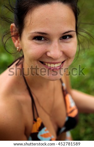 Similar – Portrait of a beautiful young woman outdoor smiling