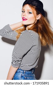 Portrait Of A Beautiful Girl In A Striped Shirt