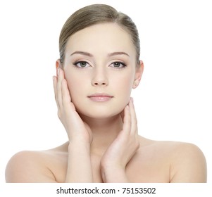 Portrait of beautiful girl stroking her pretty face with healthy skin - white background