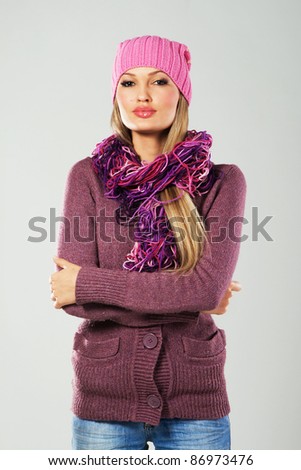 Portrait of a beautiful girl in warm clothing