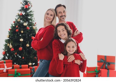 Portrait Of Beautiful Handsome Careful Cheerful Family Folded Arms Support Team At Decorated Light Home House Indoors