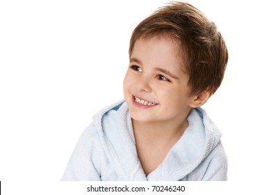 Portrait Of Beautiful Happy Smiling Little Boy In Bathrobe On White Background