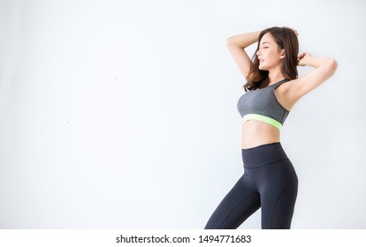 Portrait Of Beautiful Healthy Asian Woman Armpit Waxing Sport Wear Copy Space White Background. People Beauty Perfect Body Slim Fit Fitness Sexy Girl Happy Relax. Freedom Lifestyle Healthcare Concept