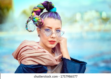 Portrait of beautiful hipster young woman with sunglasses smiling in city – Teenage girl with funky hairstyle enjoying summer day outdoor – Modern gen z teen with cool look and trendy creative style - Shutterstock ID 1757986577